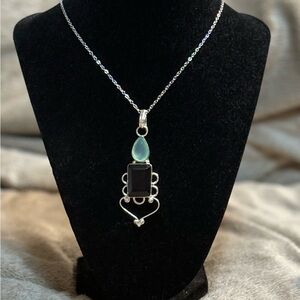 Elegant Silver and Glass Pendant Necklace